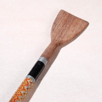 lacquered wooden spatula