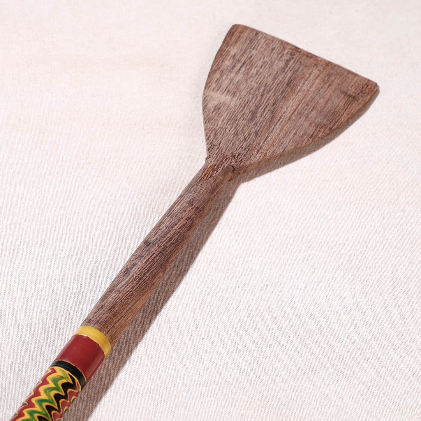 lacquered wooden spatula