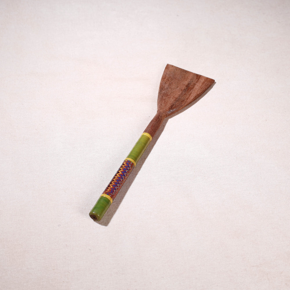 lacquered wooden spatula