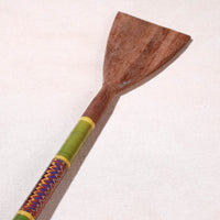 lacquered wooden spatula