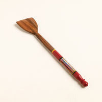 lacquered wooden spatula