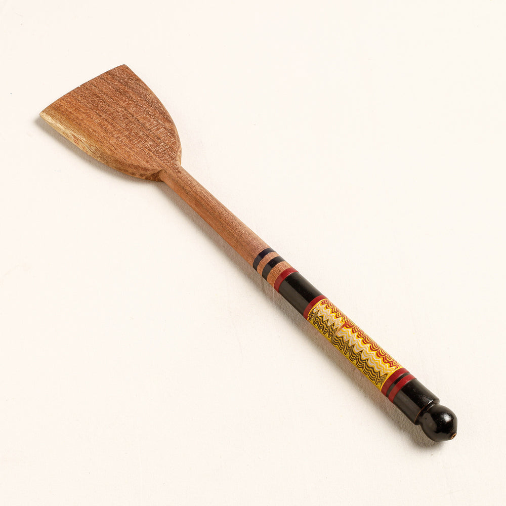 lacquered wooden spatula