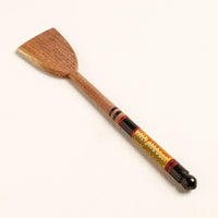 lacquered wooden spatula