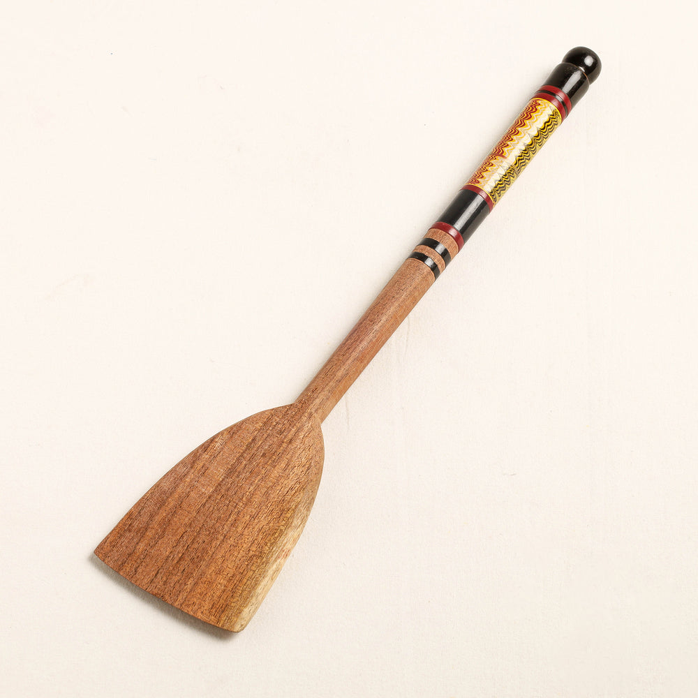 lacquered wooden spatula