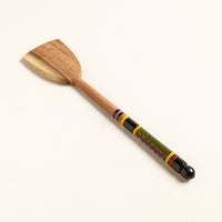 lacquered wooden spatula