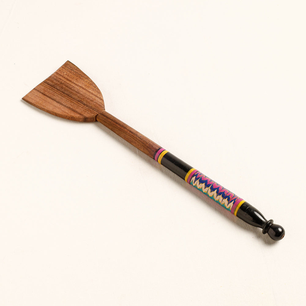 lacquered wooden spatula