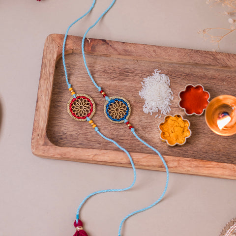 Red & Blue Sunshine Chakra Rakhi (Set of 2)