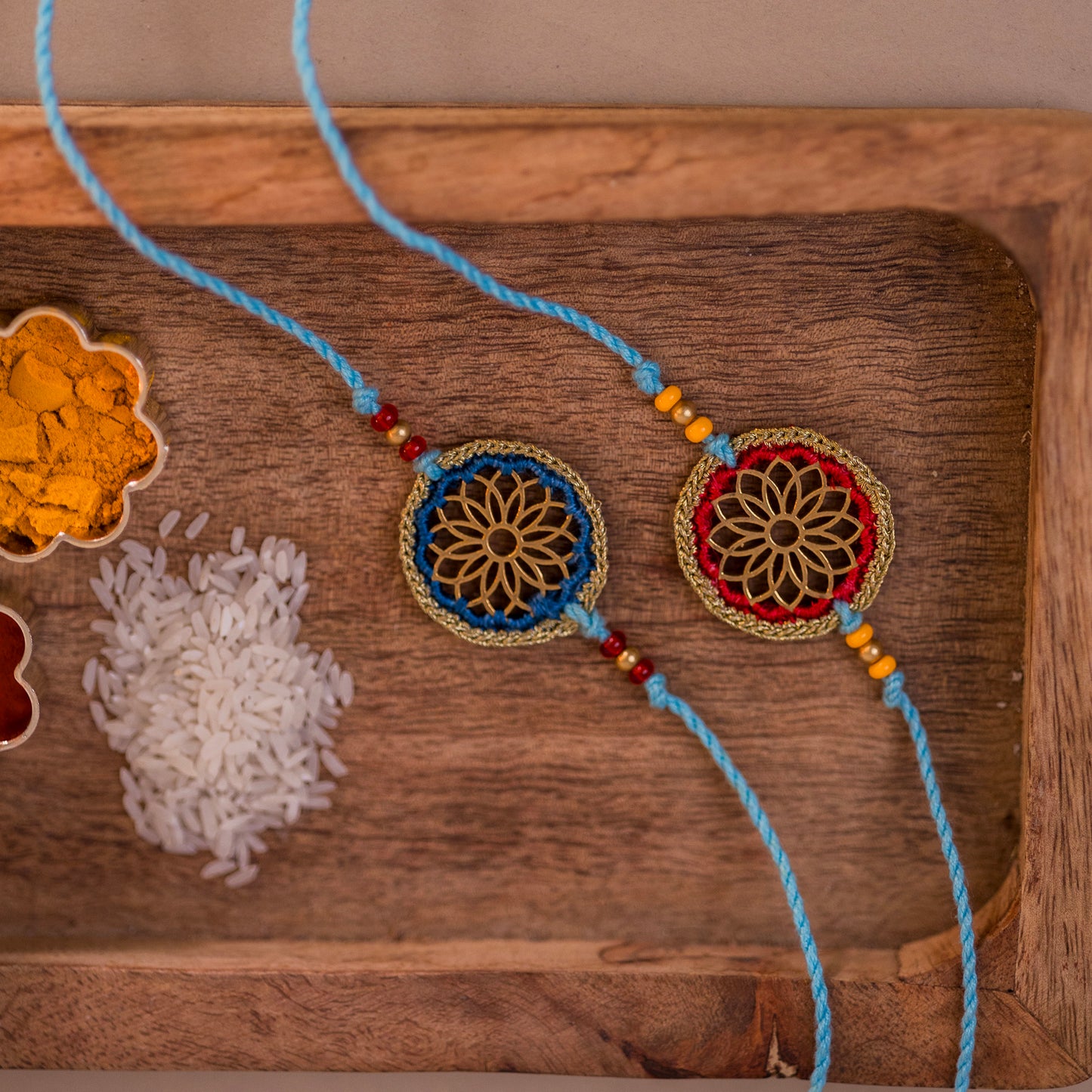 Red & Blue Sunshine Chakra Rakhi (Set of 2)