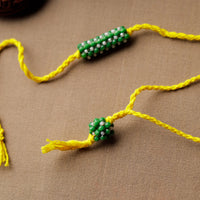 bead work rakhi and lumba set