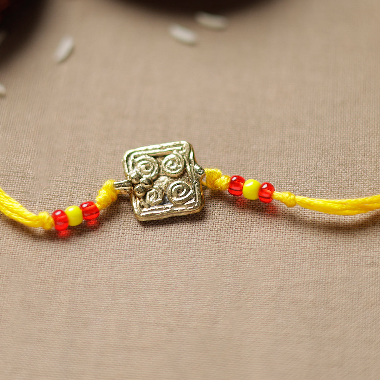 Tribal Dokra Craft Brass Rakhi by Miharu 29