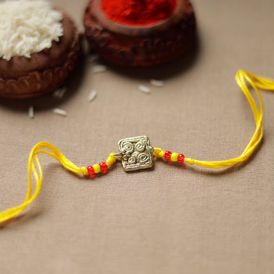 Tribal Dokra Craft Brass Rakhi by Miharu 29