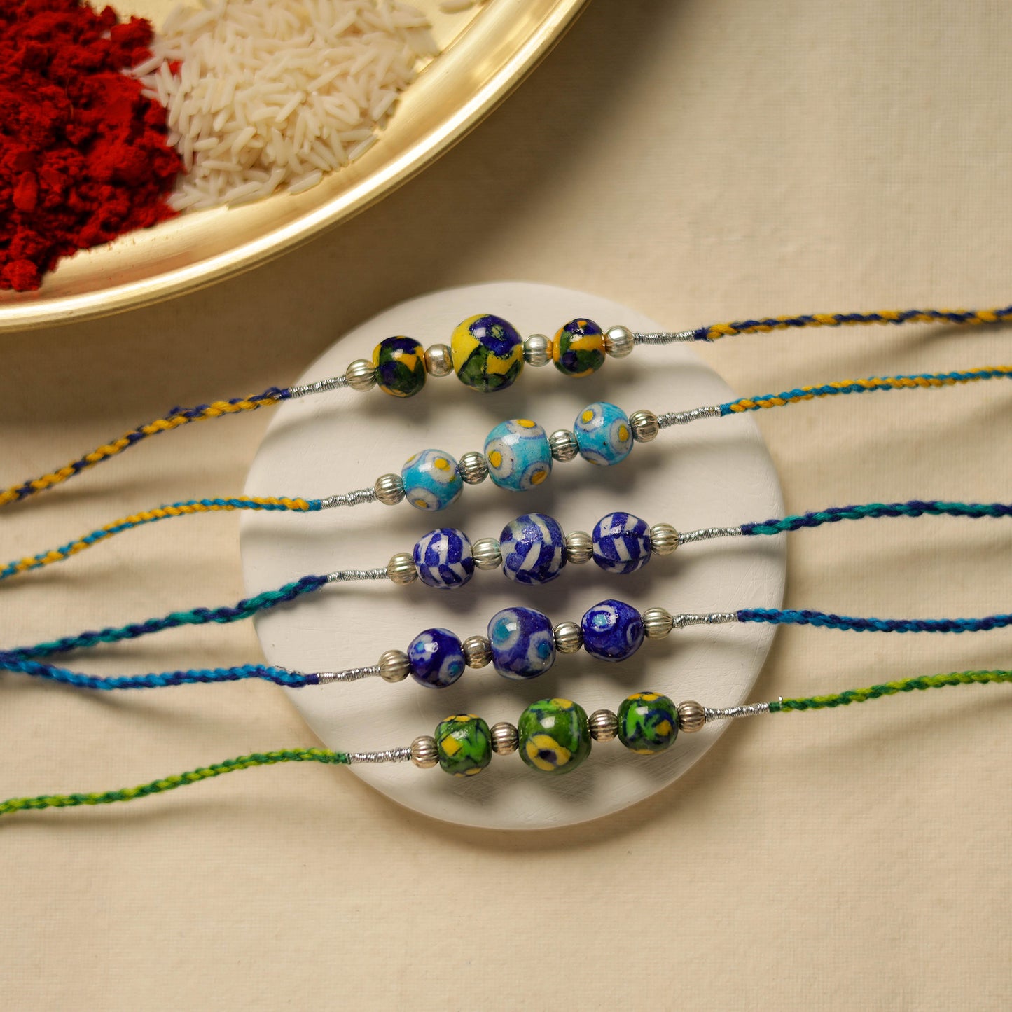 Patwa Threadwork Blue Pottery Beads Rakhi (set of 5) 15