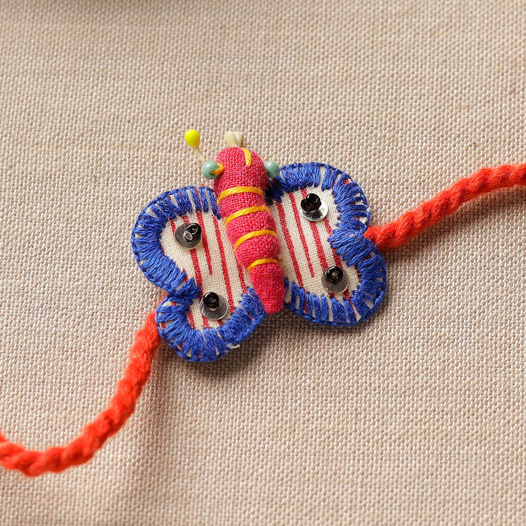 Butterfly - Upcycled Thread & Beadwork Kids Rakhi by Jan Sandesh 146