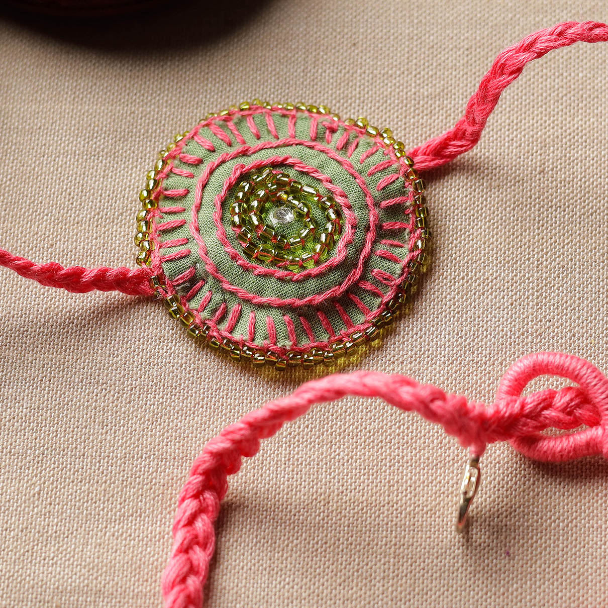 Beads & Thread Embroidered Reusable Rakhi by Neeli Titlee 147