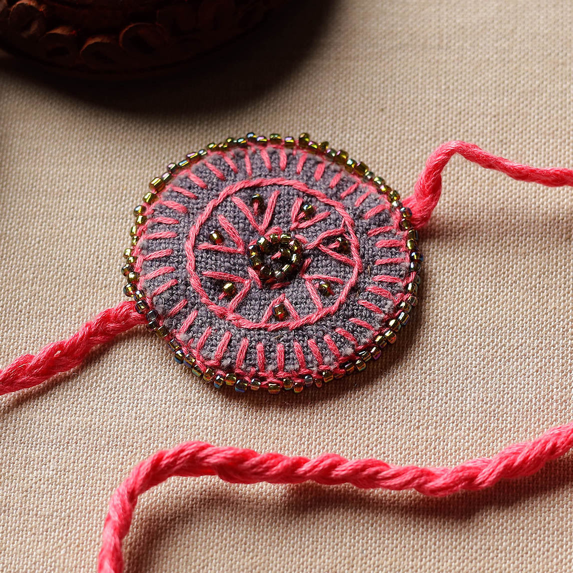 Beads & Thread Embroidered Reusable Rakhi by Neeli Titlee