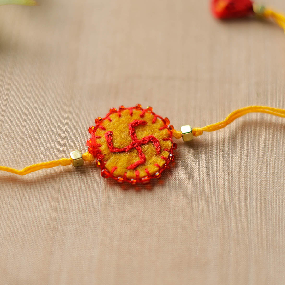 Hand Embroidered Felt Work & Beadwork Om Rakhi 204