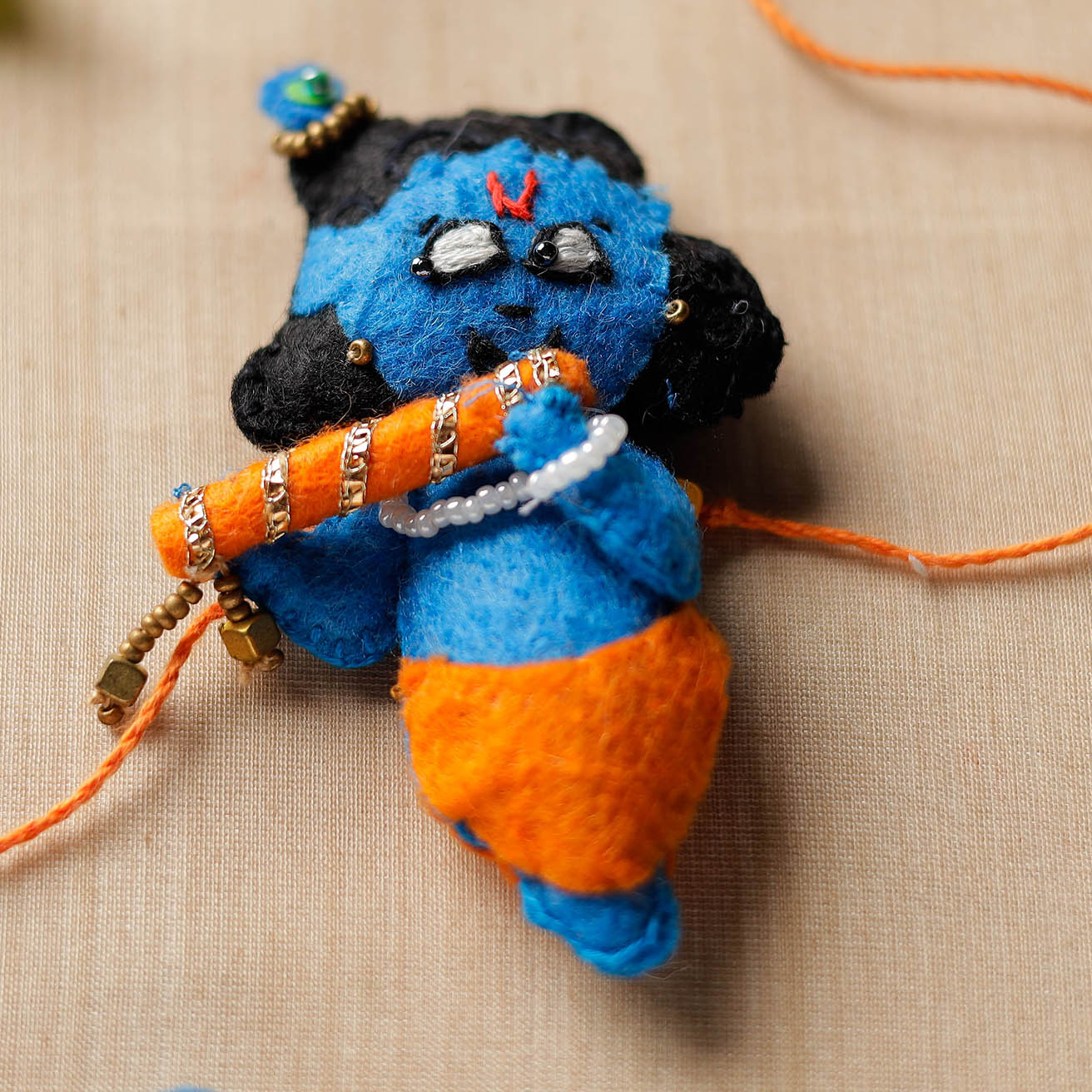 Buy Hand Embroidered Felt Work Bal krishna Rakhi 148 Online at iTokri.com