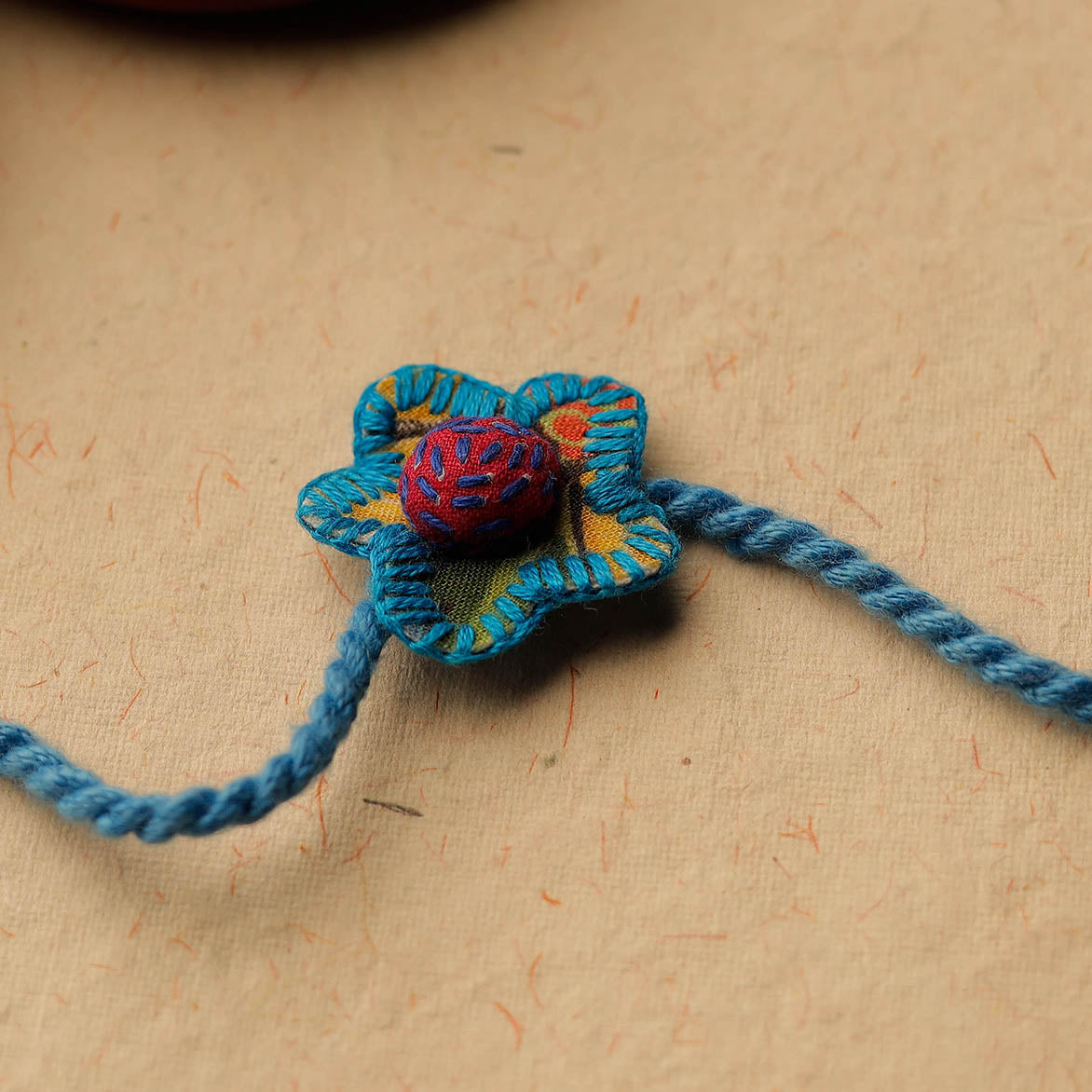 Flower - Upcycled Thread Work Kids Rakhi by Jan Sandesh 50