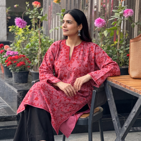 Pink Aari Heavy Hand Embroidery Kashmiri Merino Wool Pheran, worn by a model, AI visual of the pheran, iTokri