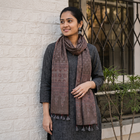 Brown Ajrakh Block Printed Pure Woolen Stole, worn by a woman, AI visual of the stole, iTokri