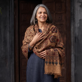 Beige Ajrakh Hand Block Print Natural Dyed Handwoven Acrylic Wool Shawl, worn by a model, AI visual of the shawl, iTokri