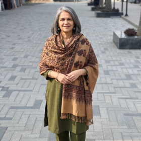 Brown Ajrakh Hand Block Print Natural Dyed Handwoven Acrylic Wool Shawl, worn by a model, AI visual of the shawl, iTokri