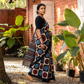 Black Ajrakh Hand Block Print Natural Dyed Pure Mul Cotton Saree, draped and worn by a woman, AI visual of the saree, iTokri