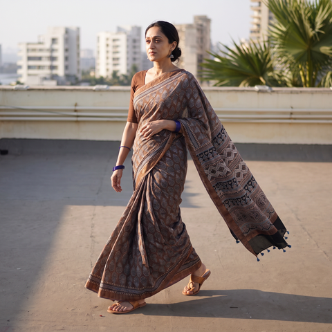 Grey Ajrakh Hand Block Print Natural Dyed Zari Border Chanderi Silk Saree, draped and worn by a woman, AI visual of the saree, iTokri