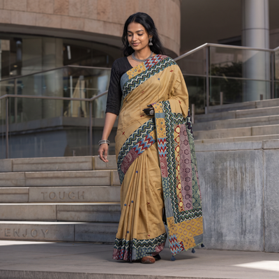 Beige Ajrakh Hand Block Print Patchwork Pure Mul Cotton Saree, draped and worn by a woman, AI visual of the saree, iTokri