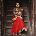 Red Ajrakh Hand Block Print Patchwork Pure Mul Cotton Saree, draped and worn by a woman, AI visual of the saree, iTokri