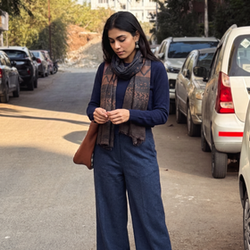Blue Ajrakh Hand Block Printed Pure Woolen Stole, worn by a woman, AI visual of the stole, iTokri