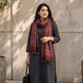 Red Ajrakh Hand Block Printed Pure Woolen Stole, worn by a woman, AI visual of the stole, iTokri