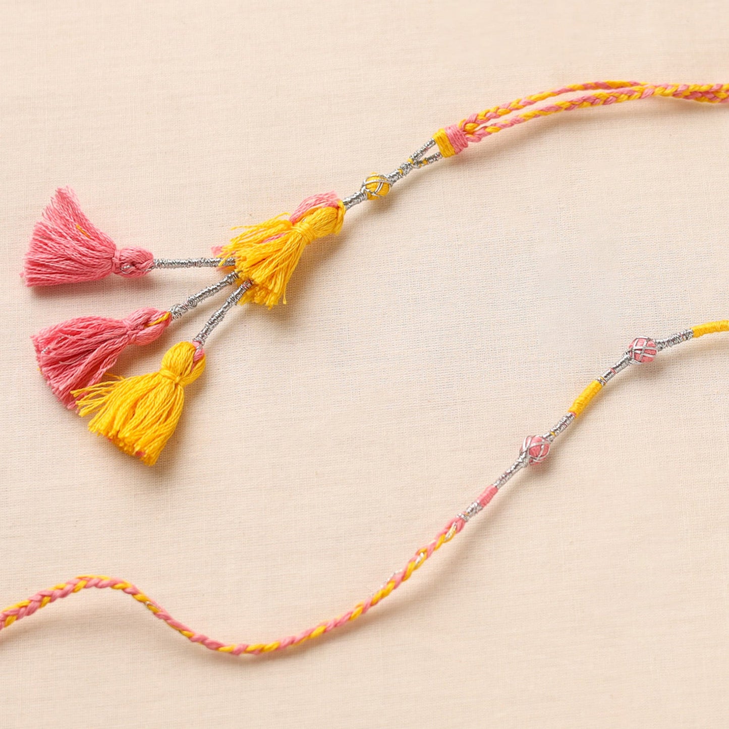 Anant Raksha Thread work Rakhi & Lumba Set