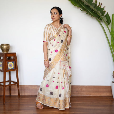 White Assam Handloom Silk Cotton Mekhela Chador with Blouse Piece, draped and worn by a woman, AI visual of the saree, iTokri