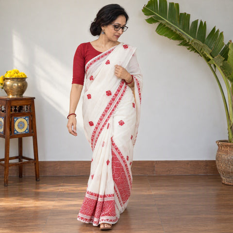 White Assam Handloom Silk Cotton Mekhela Chador with Blouse Piece, draped and worn by a woman, AI visual of the saree, iTokri