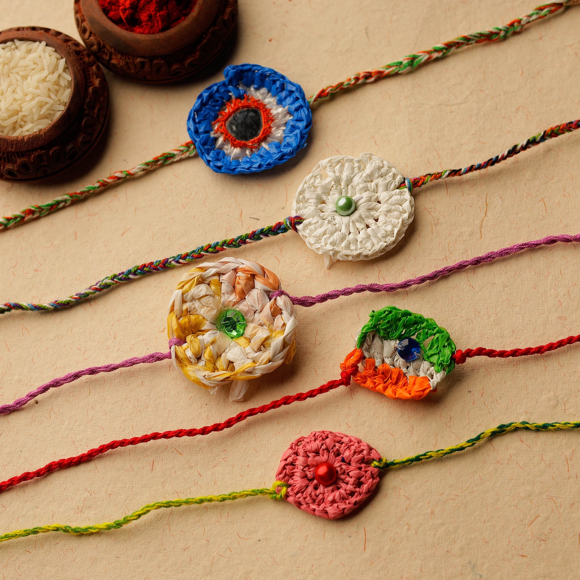 Buy  Handmade Upcycled Weave Rakhi by Khamir (Set of 5) 99 Online at iTokri.com
