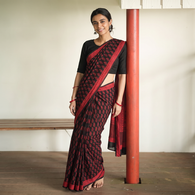 Red Bagh Hand Block Print Natural Dyed Cotton Saree, draped and worn by a woman, AI visual of the saree, iTokri