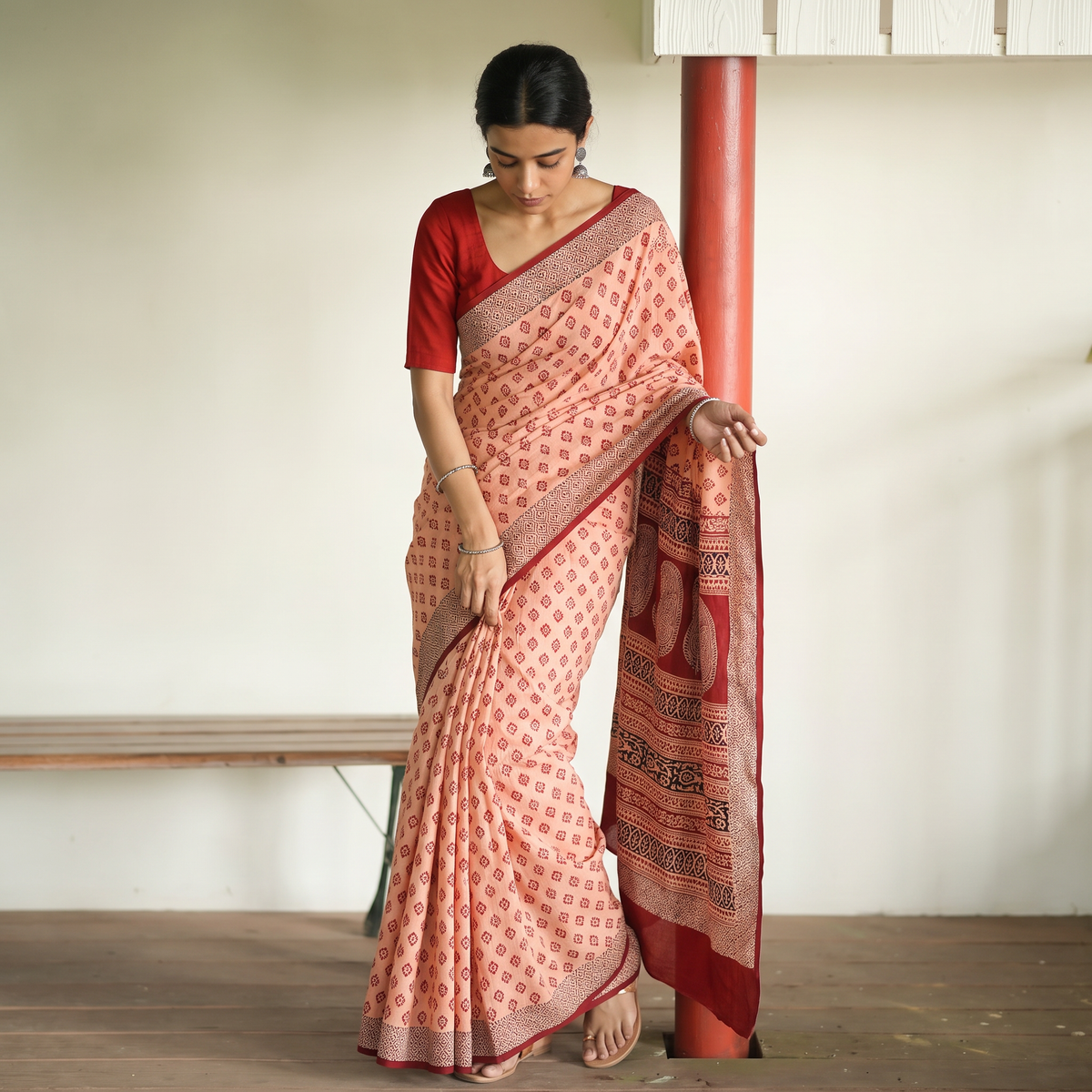 Peach Bagh Hand Block Print Natural Dyed Cotton Saree, draped and worn by a woman, AI visual of the saree, iTokri