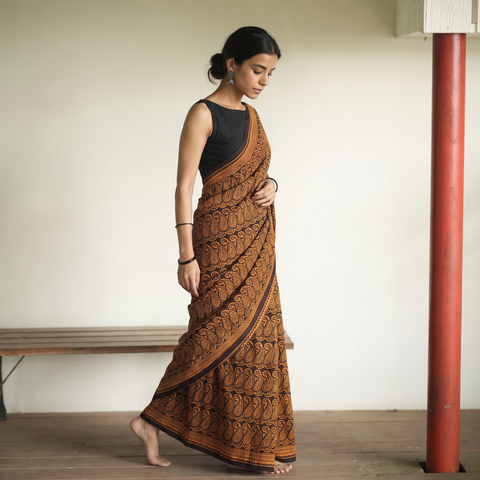 Orange Bagh Hand Block Print Natural Dyed Cotton Saree, draped and worn by a woman, AI visual of the saree, iTokri