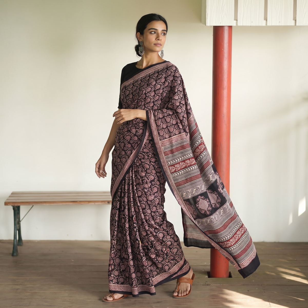 Black Bagh Hand Block Print Natural Dyed Cotton Saree, draped and worn by a woman, AI visual of the saree, iTokri