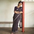 Black Bagh Hand Block Print Natural Dyed Cotton Saree, draped and worn by a woman, AI visual of the saree, iTokri
