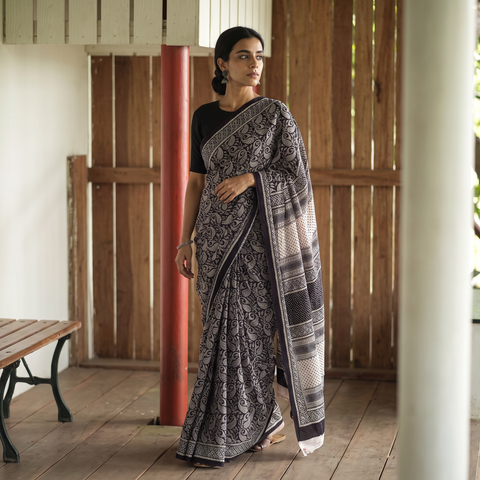 Black Bagh Hand Block Print Natural Dyed Cotton Saree, draped and worn by a woman, AI visual of the saree, iTokri