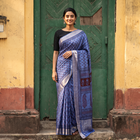 Blue Bagh Hand Block Print Natural Dyed Dola Silk Zari Border Saree, draped and worn by a woman, AI visual of the saree, iTokri
