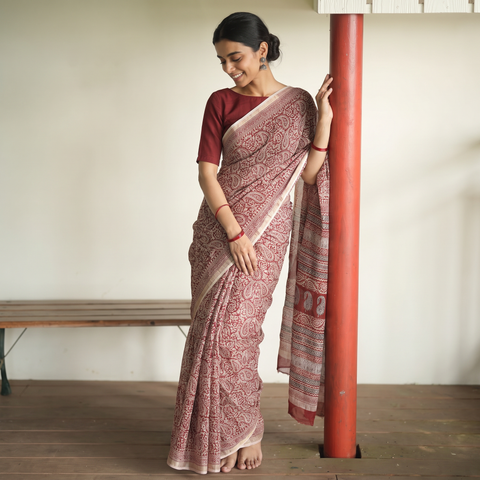 Red Bagh Hand Block Print Natural Dyed Kota Doria Cotton Saree, draped and worn by a woman, AI visual of the saree, iTokri