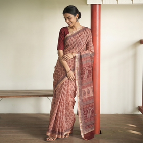 Peach Bagh Hand Block Print Natural Dyed Kota Doria Cotton Saree, draped and worn by a woman, AI visual of the saree, iTokri
