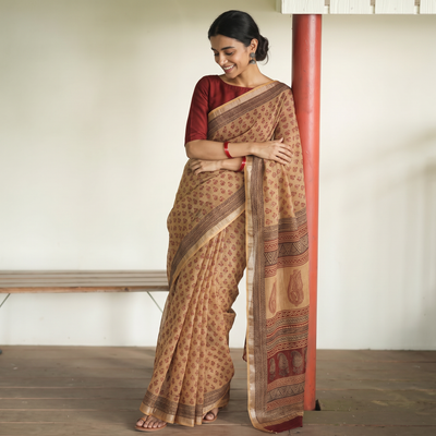 Beige Bagh Hand Block Print Natural Dyed Kota Doria Cotton Saree, draped and worn by a woman, AI visual of the saree, iTokri