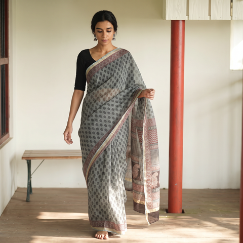 Grey Bagh Hand Block Print Natural Dyed Kota Doria Cotton Saree, draped and worn by a woman, AI visual of the saree, iTokri