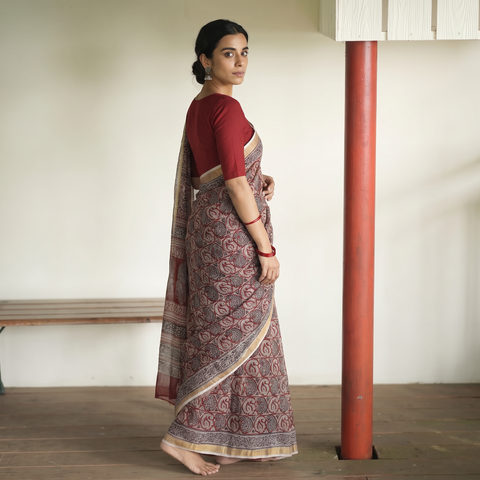 Red Bagh Hand Block Print Natural Dyed Kota Doria Cotton Saree, draped and worn by a woman, AI visual of the saree, iTokri