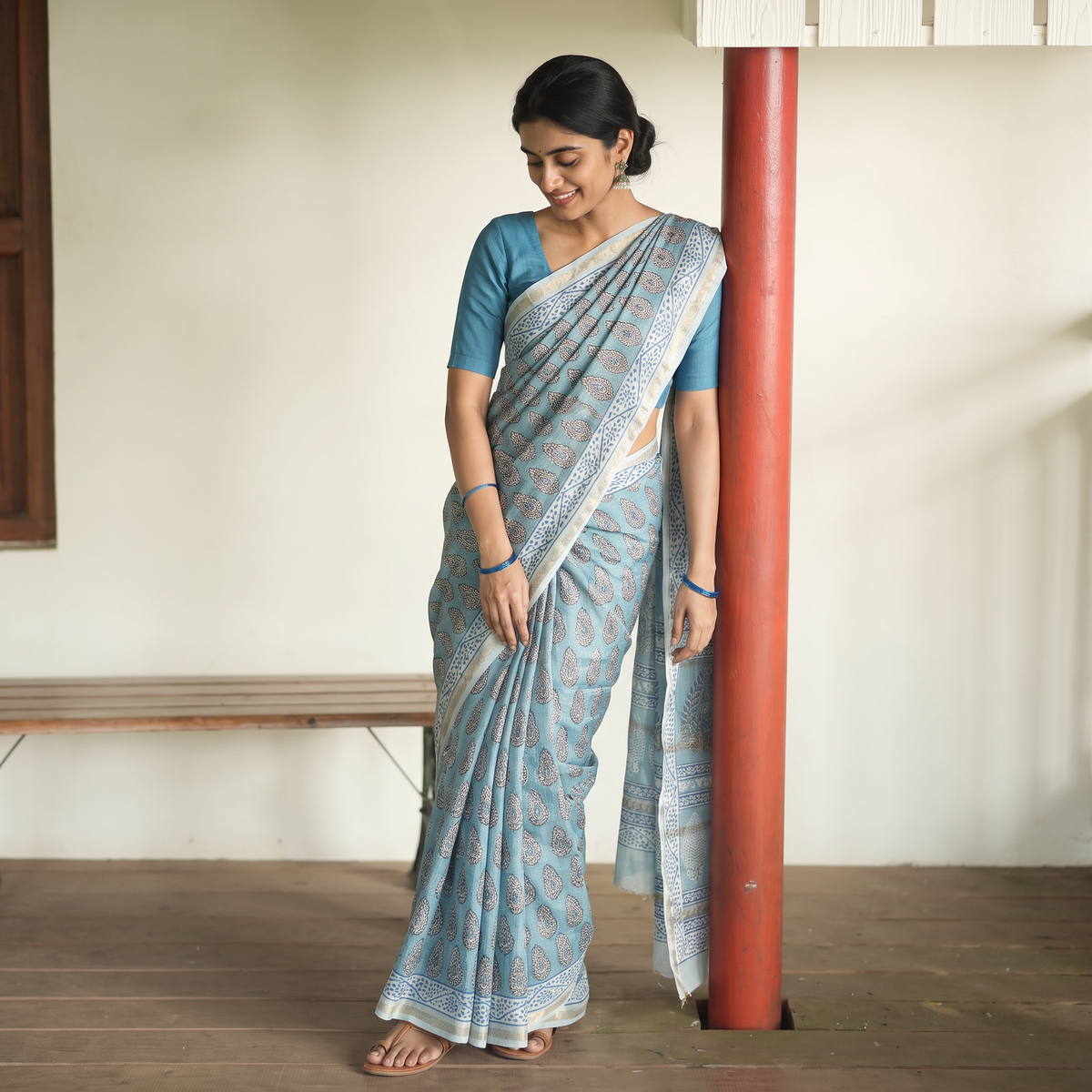 Blue Bagh Hand Block Print Natural Dyed Maheshwari Silk Zari Border Saree, draped and worn by a woman, AI visual of the saree, iTokri