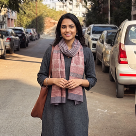 Brown Bagh Hand Block Printed Merino Woollen Stole, worn by a woman, AI visual of the stole, iTokri